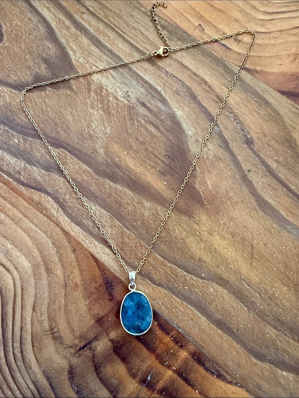 Goldtone Necklace with Deep Blue Oval Pendant 9” Chain.